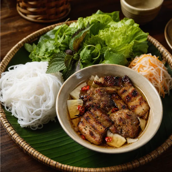 Charcoal-grilled pork belly on vermicelli
